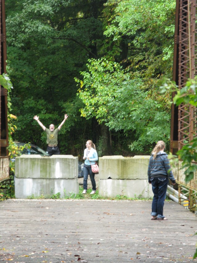 Brother Joe, Niece Steph, and Friend Sami. enjoying proper grammar at the lost haunted bridge near Greencastle.